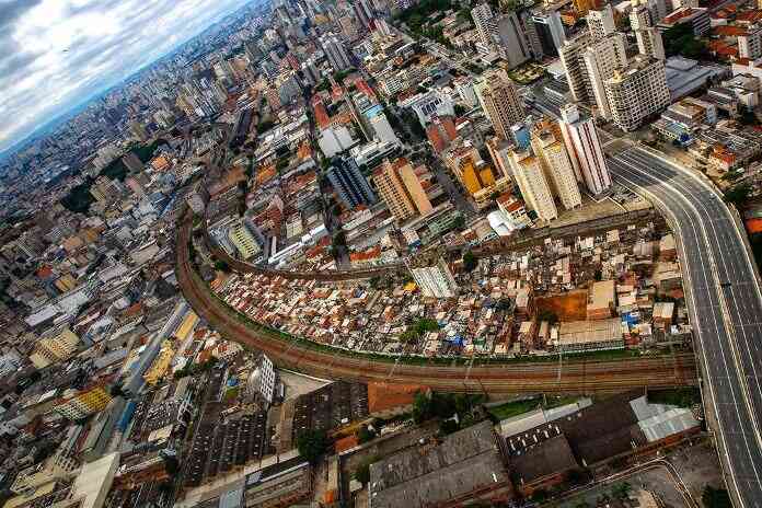Brazil Slum between rail track